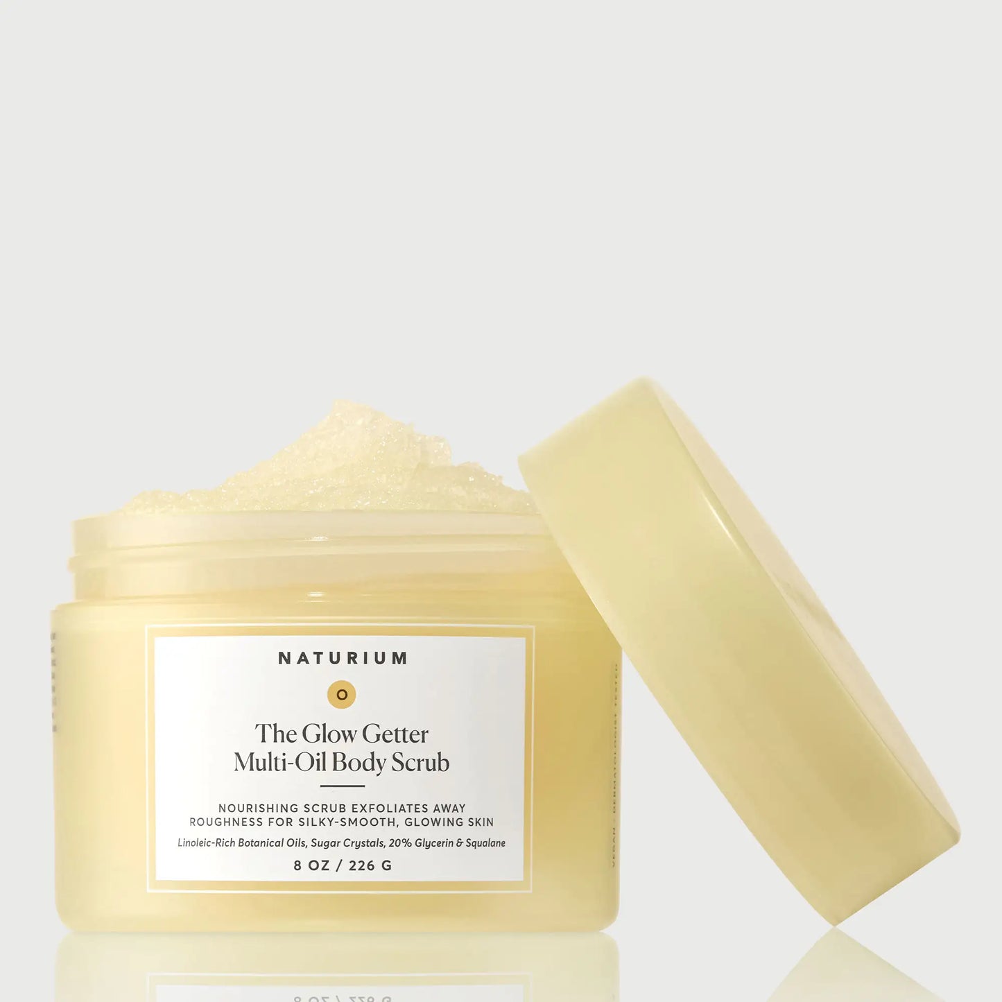 the-glow-getter-multi-oil-body-scrub-a5 NATR-40028-GlowGetter-Multi-Oil-Body-Scrub-Front-CapOff-bonebkgd.webp