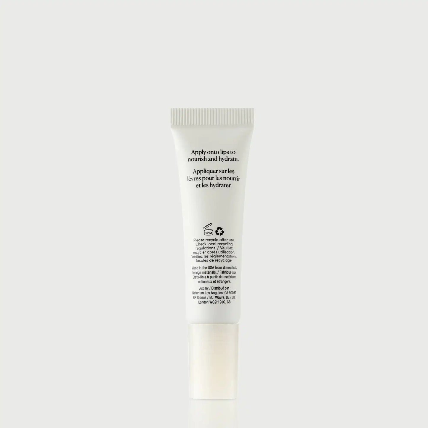phyto-glow-lip-balm-clear-z0 NATR-60066_PhytoGlow_Clear_primary_capon_back-bonebkgd.webp