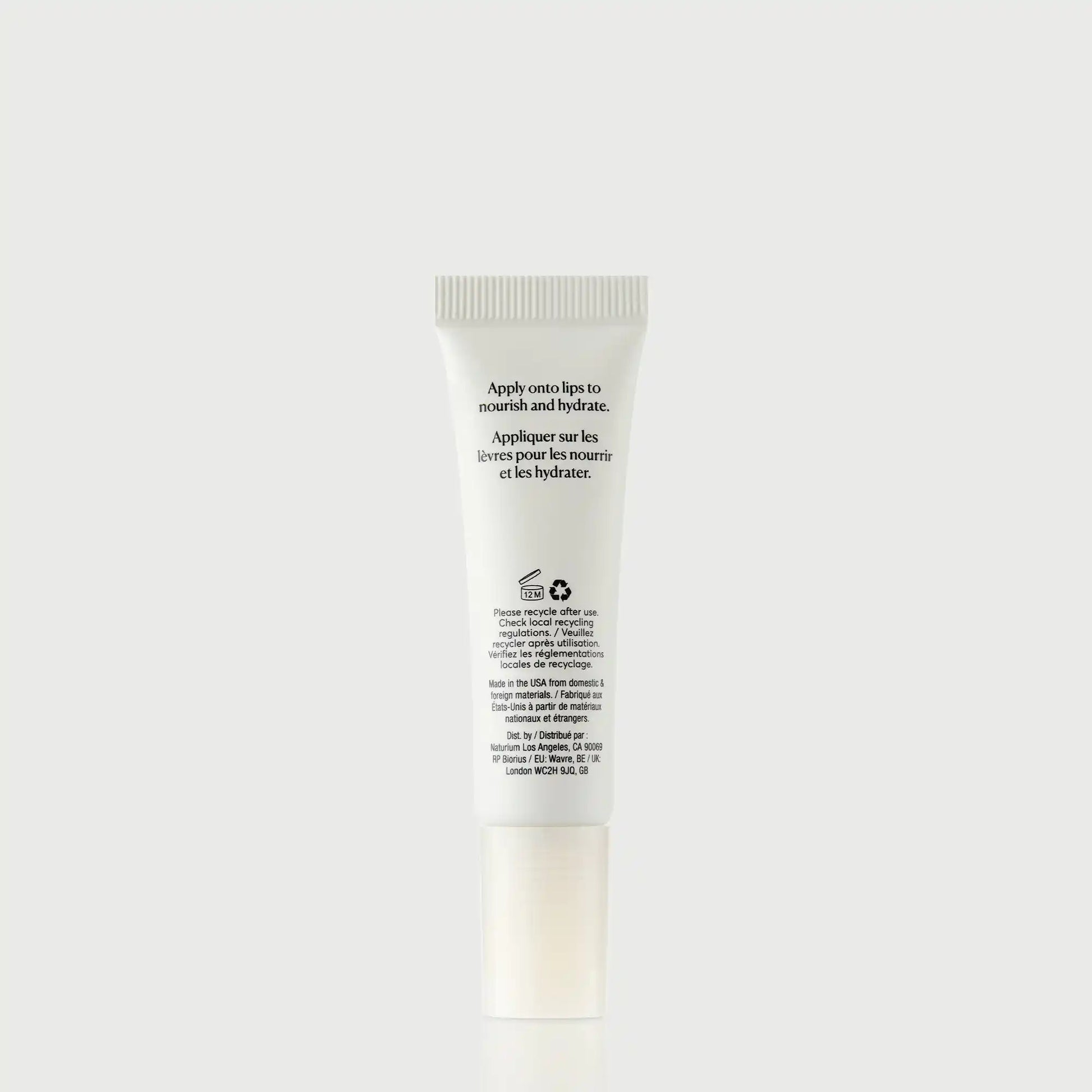 phyto-glow-lip-balm-clear-z0 NATR-60066_PhytoGlow_Clear_primary_capon_back-bonebkgd.webp